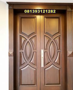 Model Pintu Depan Jati Kupu Tarung Mewah